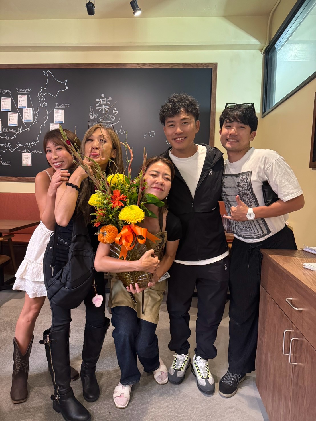 Celebrating together at LaLa with flowers.