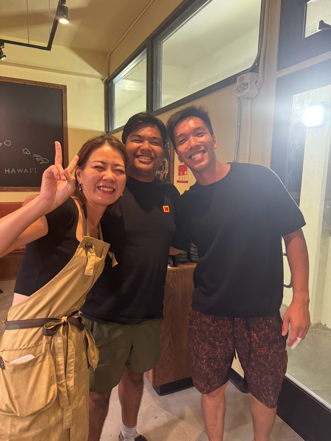 Three smiling people at LaLa.