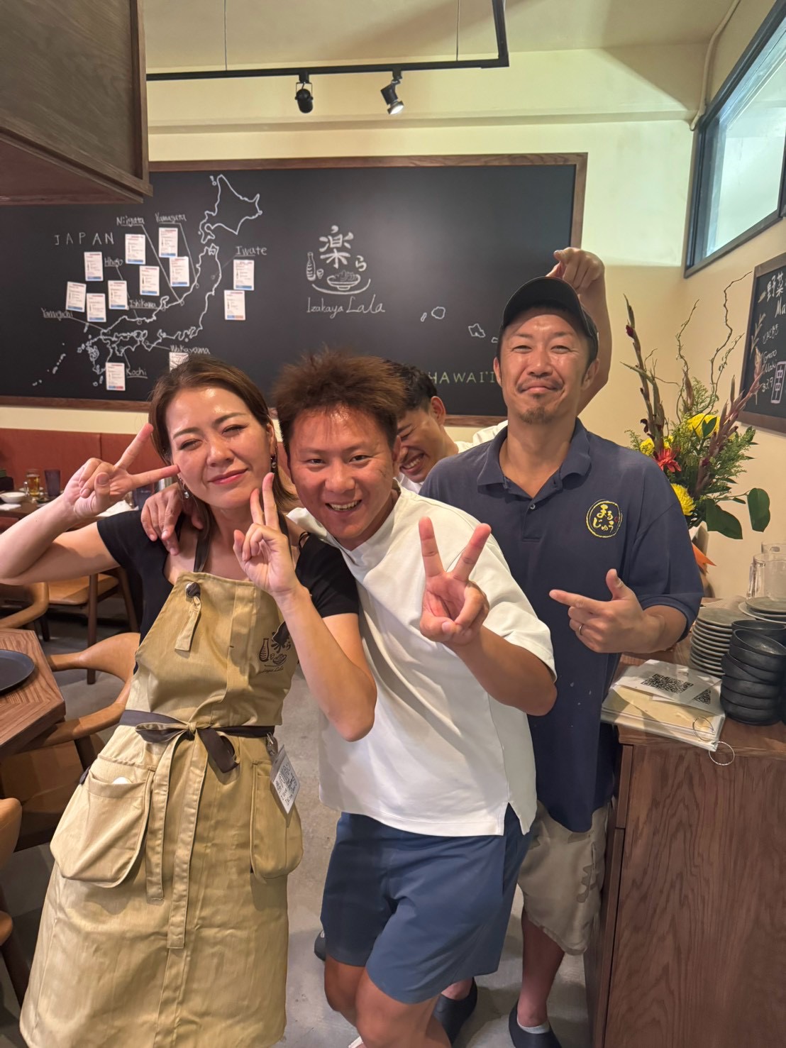 A group celebrating together inside LaLa.